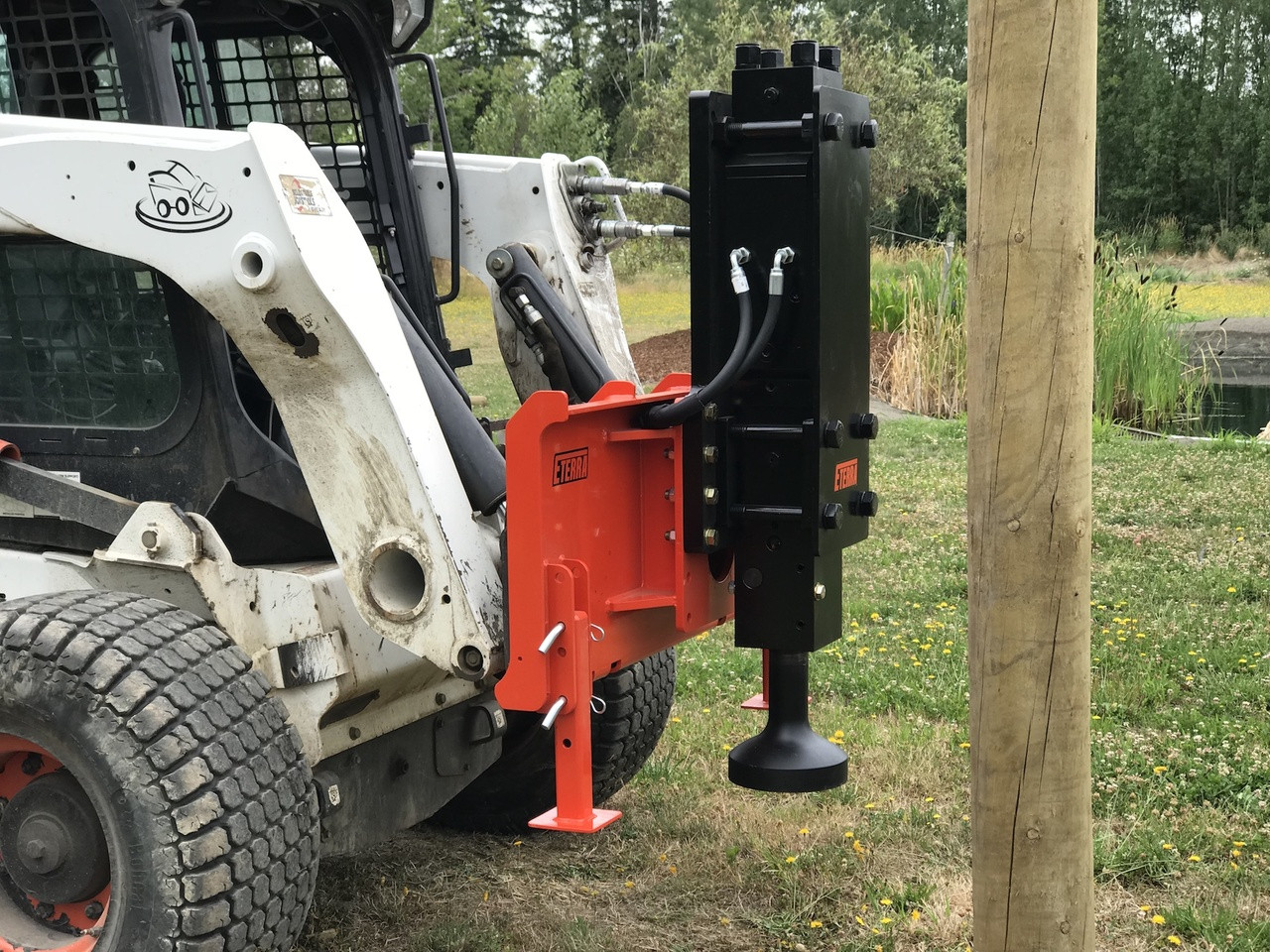 Helical pier driver for skid steer